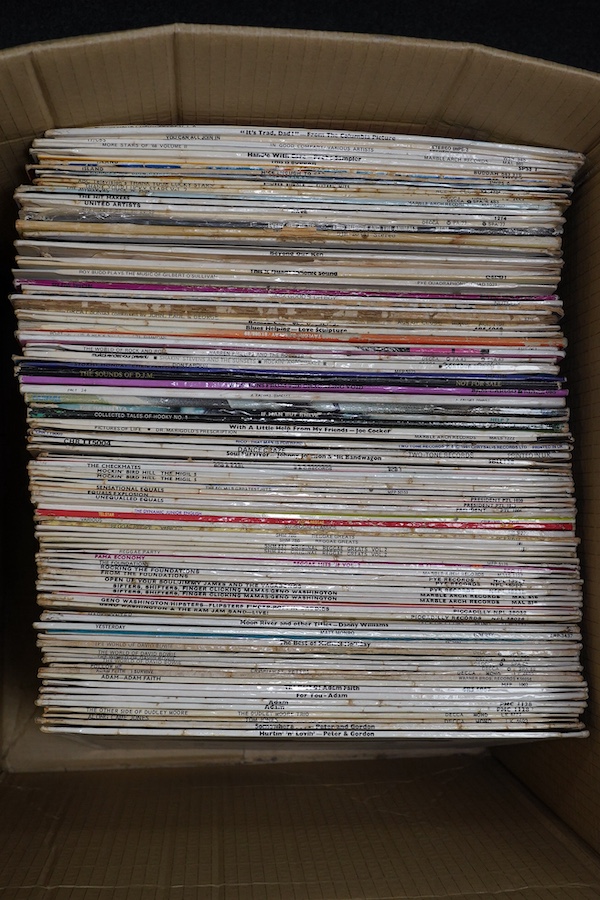 Two boxes of LP record albums, including some compilations, comedy, etc., artists include; Adam Faith, Gino Washington, Joe Cocker, the Goons, Spike Milligan, Che Atkins, Duane Eddy, Floyd Cramer, the Shadows, etc. Condi